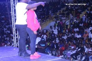 Nii Funny performs with pregnant woman at Fancy Gadam's concert