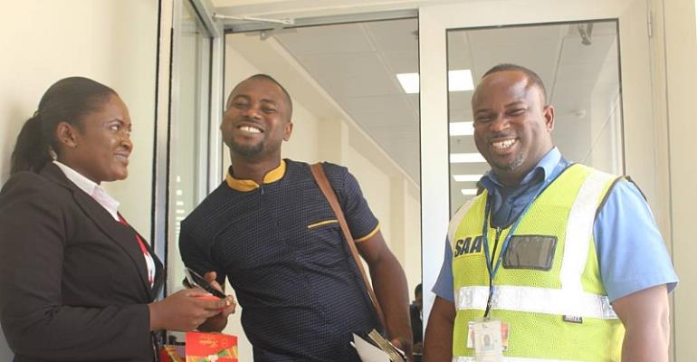 Staff of Ghana Airport presents chocolates to Abeiku Santana on Val's Day