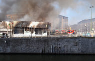 Fire destroys canalside furniture store, one injured