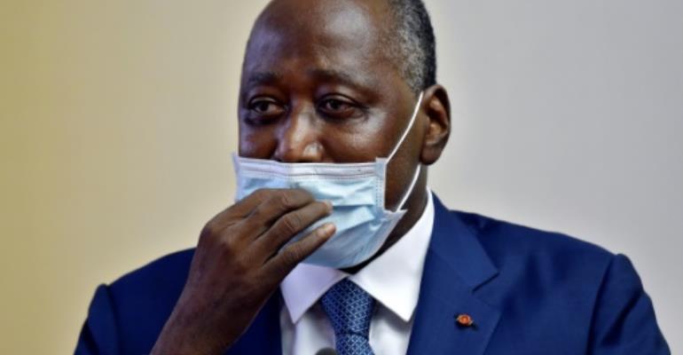 Ivory Coast PM and presidential candidate Coulibaly dies aged 61